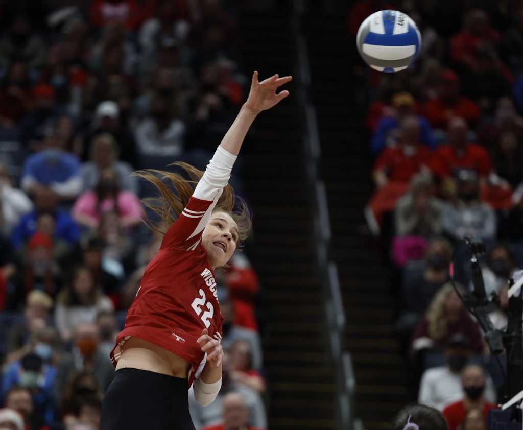 Julia Orzol serves.
