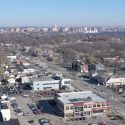 Aerial view of South Madison neighborhood with State Capitol and Lake Mendota in the distance.