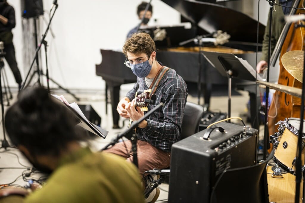 Members of the UW Contemporary Jazz Ensemble join the music.