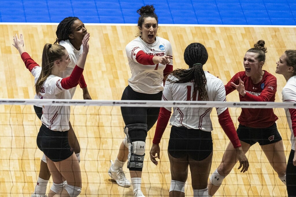 Giorgia Civita celebrates a point with teammates.