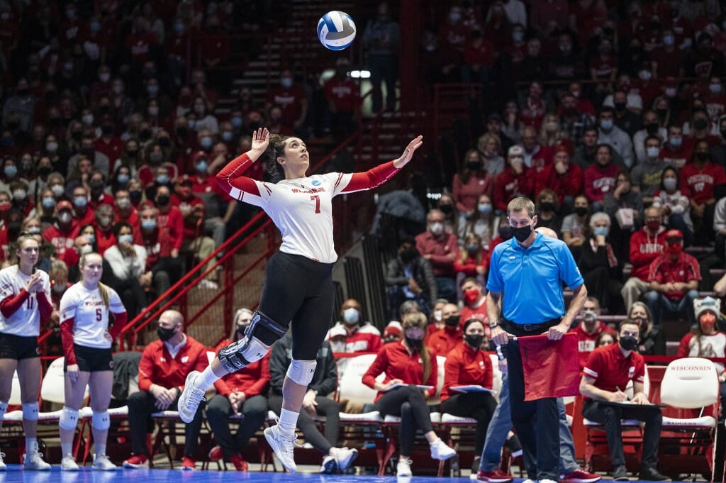 Wisconsin player preparing to hit the ball