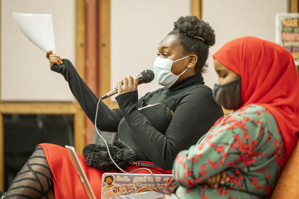 UW student and discussion panel member Brittany “Bee” Robbins asks the audience a question during the Soul Talk event.