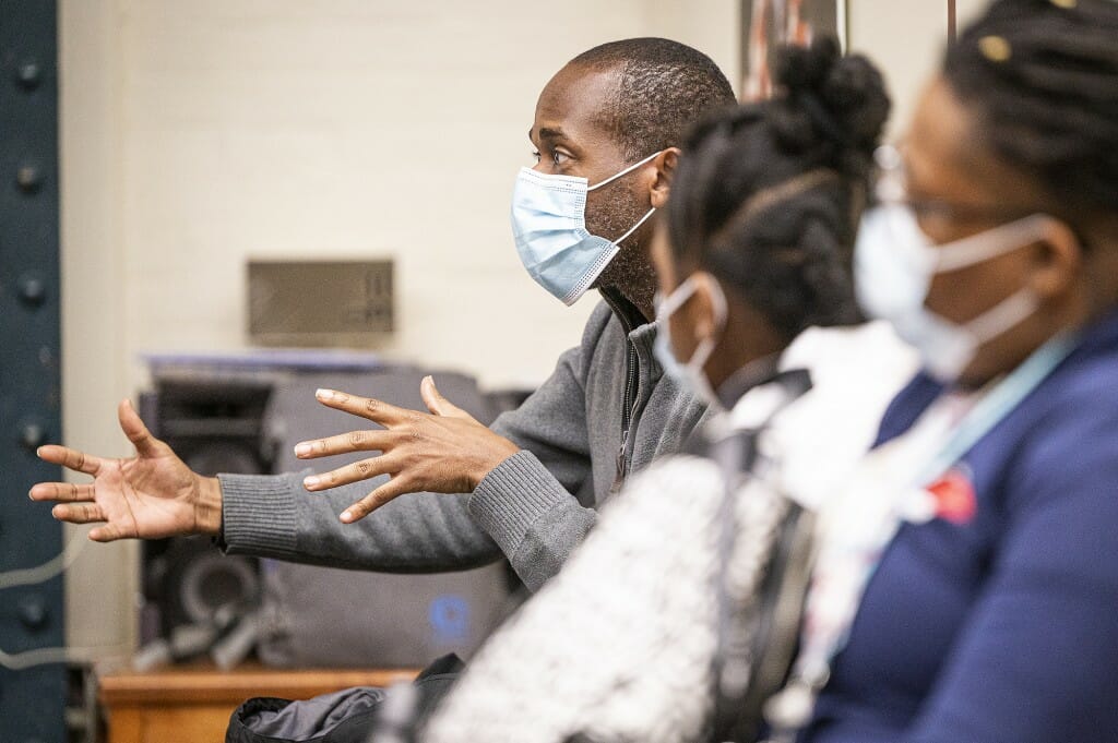 An audience member makes a point of Black representation in media.