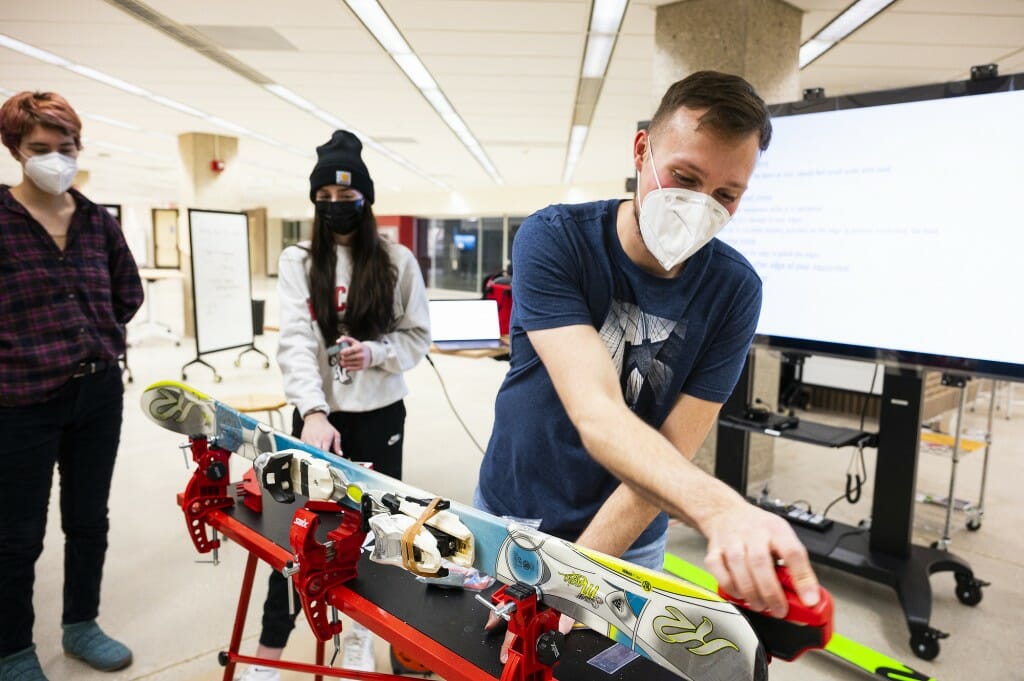 Jan Maroske, an assistant shop manager at the Design + Innovation Labs, leads the waxing workshop.