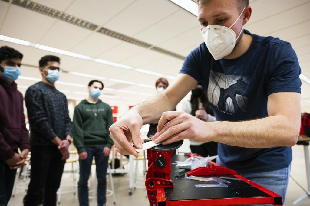 Maroske demonstrates the waxing technique.