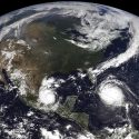 A satellite image showing clouds in a swirling hurricane pattern.