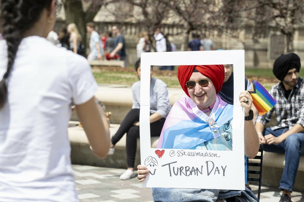 Madison resident Willow Fryrear shows off their newly tied turban.