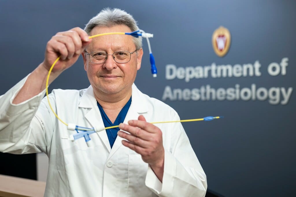 George Arndt holding an Arndt Endobronchial Blocker