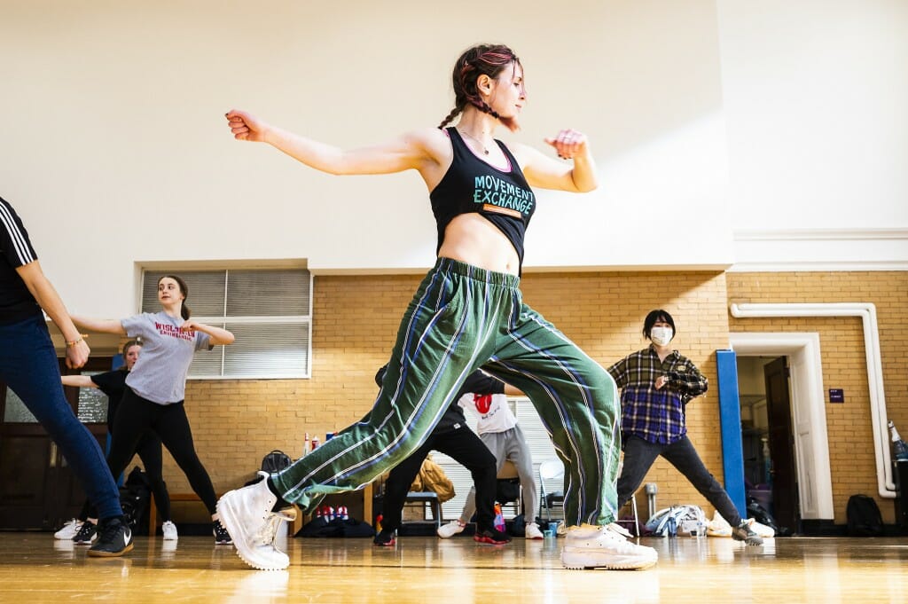 Students enthusiastically try out some steps during the hip-hop dance course.