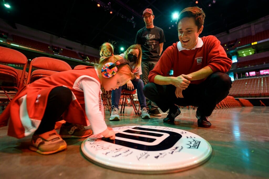 The drum cover gifted to Ila was signed by members of the drum section.