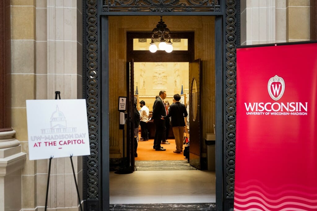 View from hallway looking into hearing room through open doors