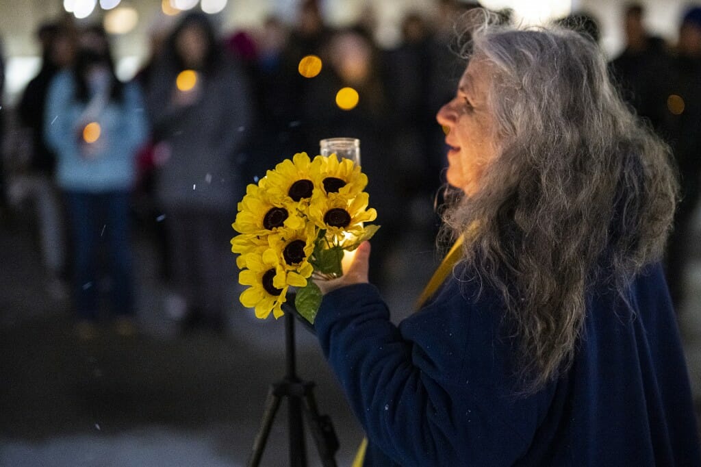 Reverend Selena Fox from the Circle Sanctuary near Barneveld, Wisconsin, addresses the vigil attendees.