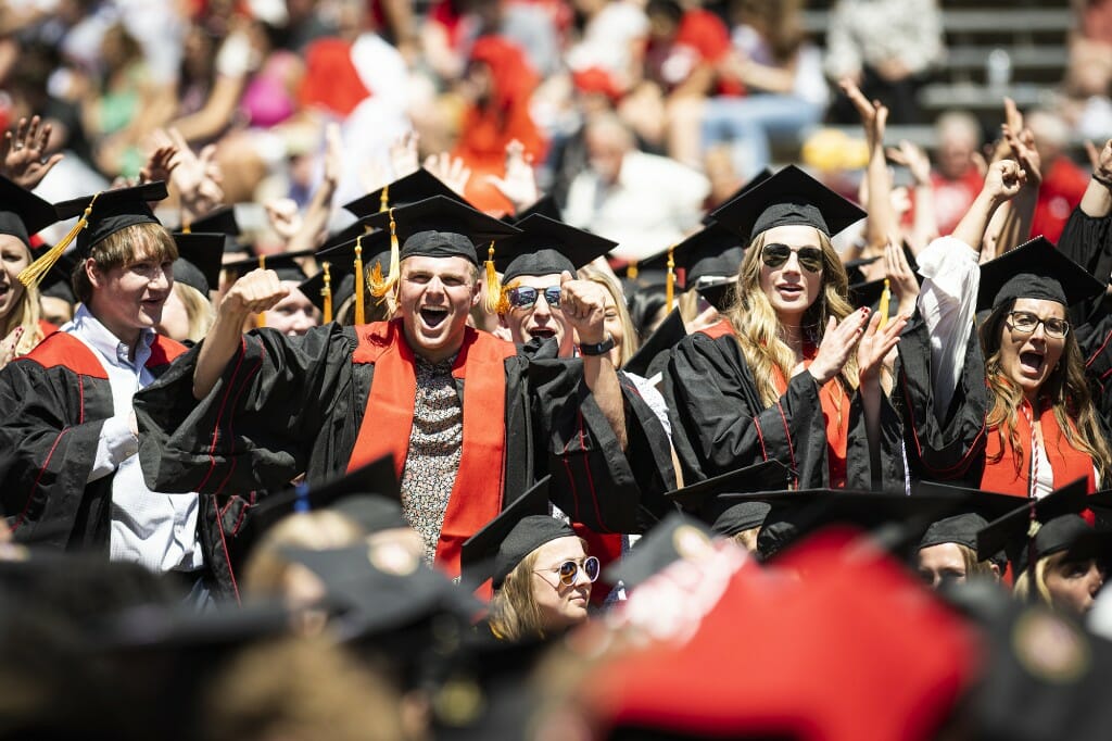 A group of people in caps and gowns