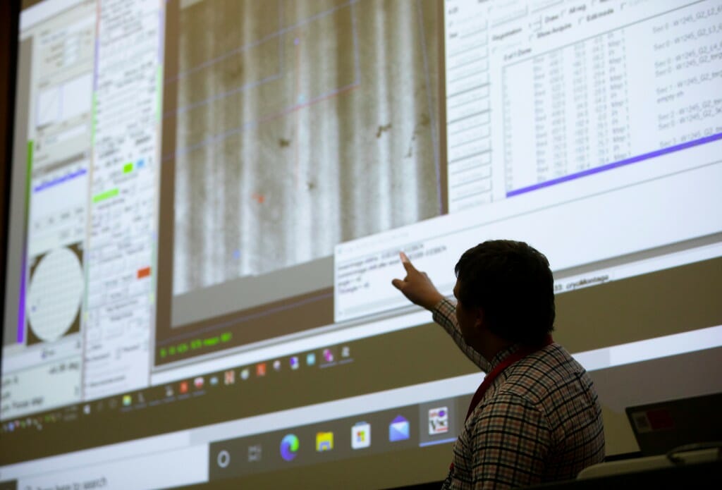 Postdoctoral researcher Daniel Parrell explains how to use cryo-electron tomography data to produce an image known as a 3D tomogram. The montage shows biological structures in a thin layer of human cells and was collected using remote access capabilities and a focused ion beam. Remote training and operation of equipment are both features of the new centers.