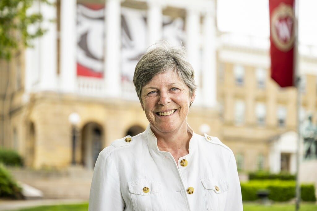 Portrait of Jocelyn Milner standing in front of Bascom Hall