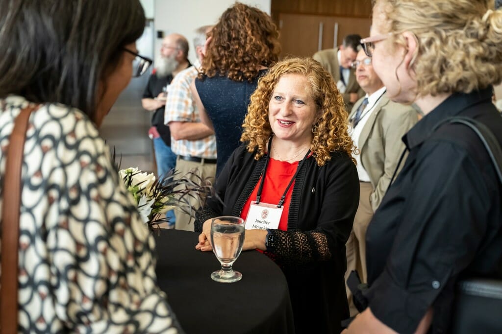 Several people chatting at a reception