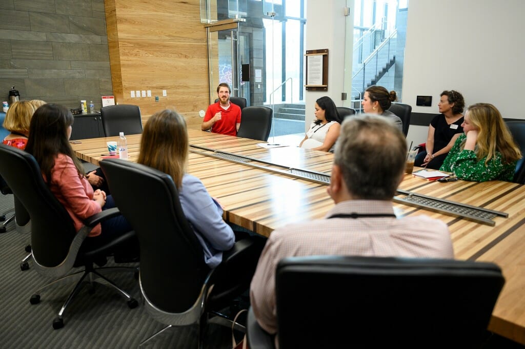 At center, meat plant operations manager Dillon Walker speaks to members of the USDA Senate Agriculture Appropriations Subcommittee staff.