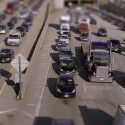 Overhead view of dozens of vehicles on a highway