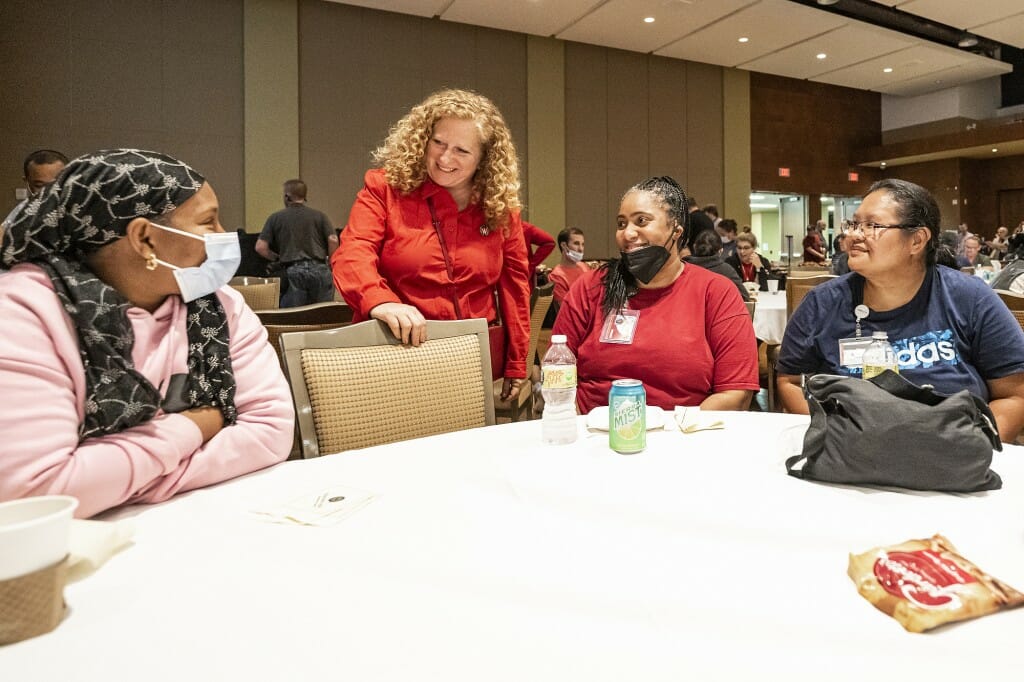 Chancellor Jennifer Mnookin speaks with  Houssainatou Bah, Rita Dancy and Dechen Chomor, all custodial staff with Facilities Planning and Management.