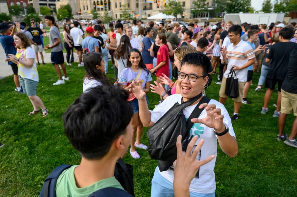 Uncertainty was replaced by enthusiasm as new students sang, danced, and in this case roared at each other.