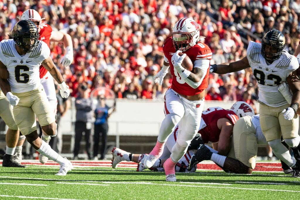 Wisconsin running back Braelon Allen (0) breaks for open field in the first quarter.