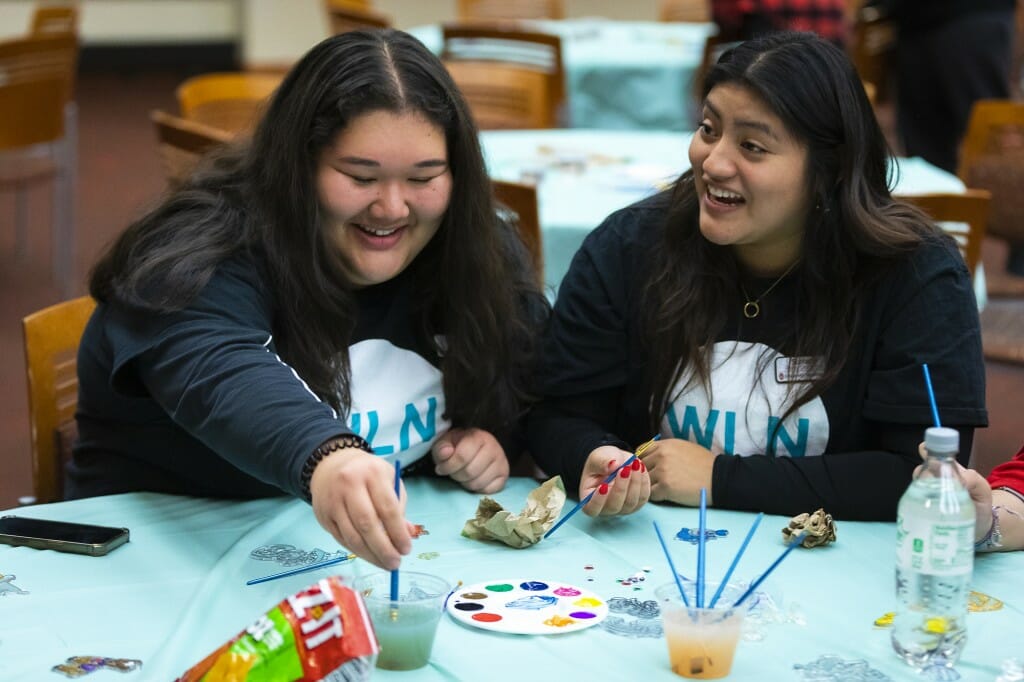 Wisconsin Late Night Coordinators Deanna Hebbring (left) and Stefany Perez (right) join in the fun. The group aims to offer some alcohol alternative activities for students.