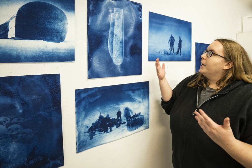 Third-year graduate printmaking student Sophie Loubere talks about artwork from her Relics series of prints in her studio space in the Humanities Building. Her work is interdisciplinary and research-based, focusing on printmaking, book arts, photography, textiles and creative writing.