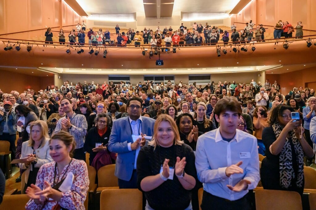 The audience gives Smith a standing ovation after his talk.