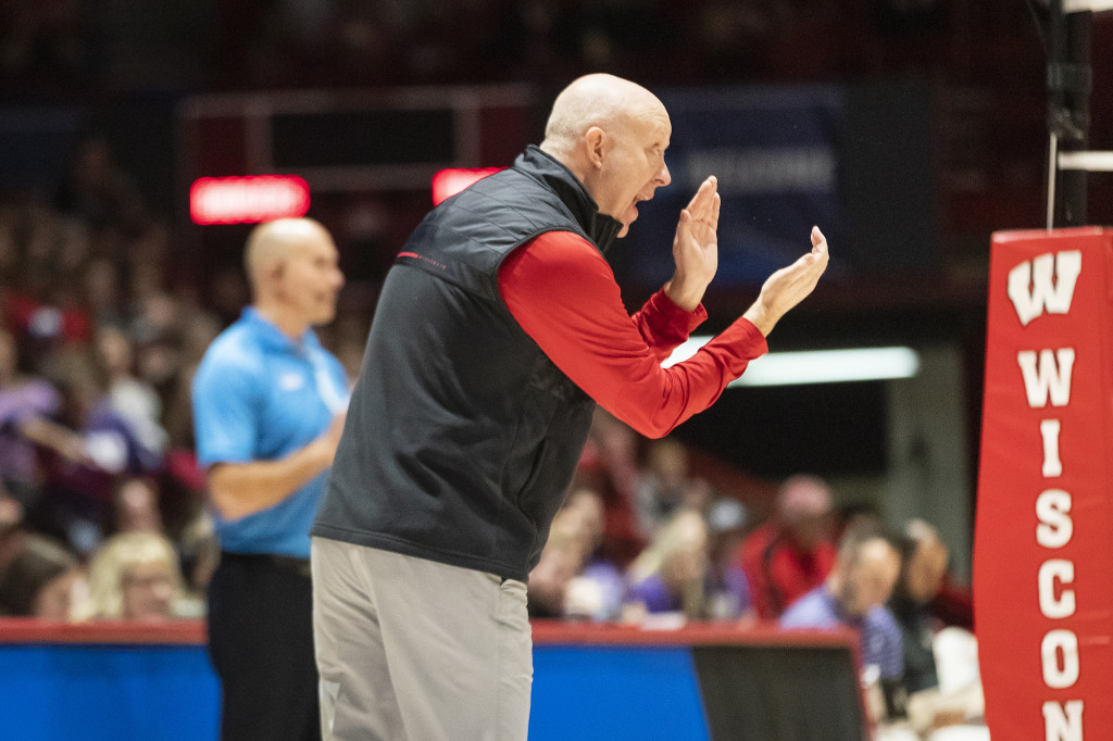 Head Coach Kelly Sheffield cheers on the team.