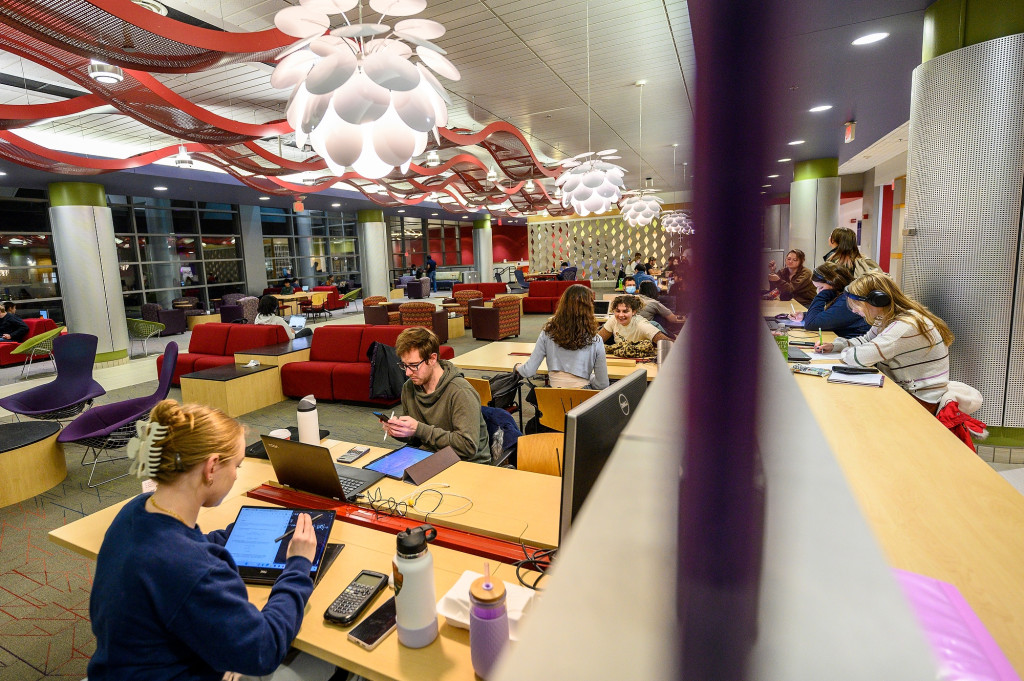 Olivia Janson, and Joshua Birke, next to her, study aerodynamics for an exam in the Huibregtse Family Commons in Engineering Hall. The two picked this spot because they like the outlets in the table. “It’s always good thing to be here. It's always warmer here than anywhere else.”