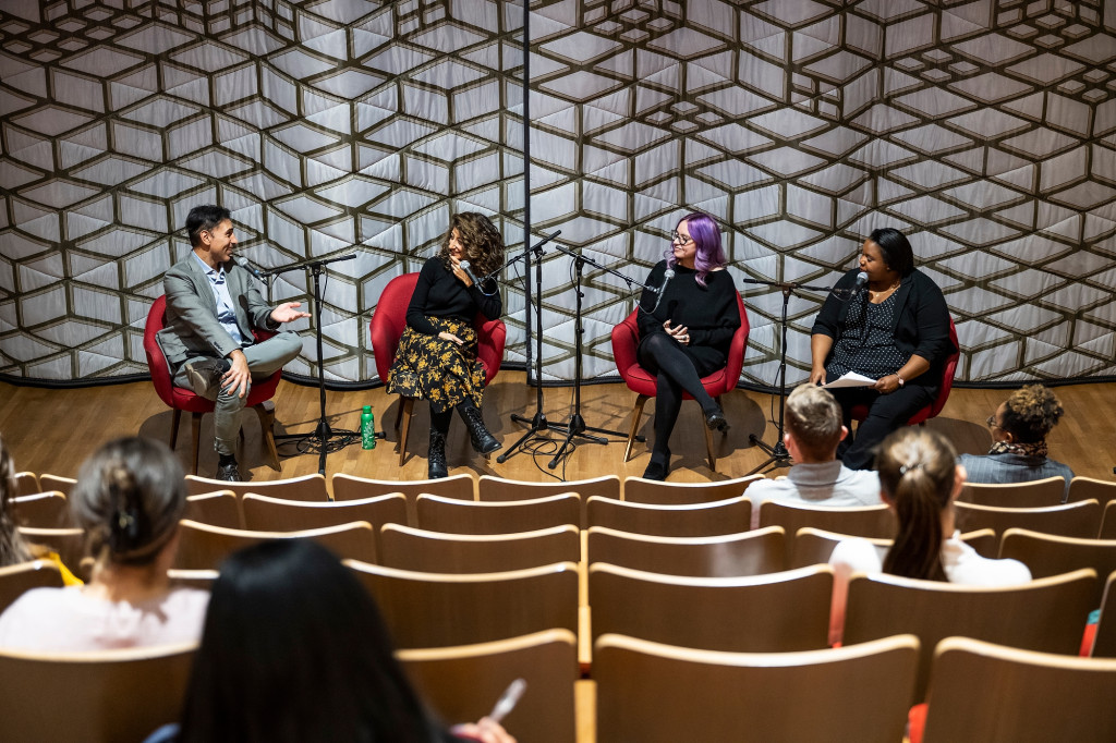 From left to right on stage, Ramtin Arablouei, Rund Abdelfatah, Kacie Lucchini Butcherand Christy Clark-Pujara engage in a panel discussion.