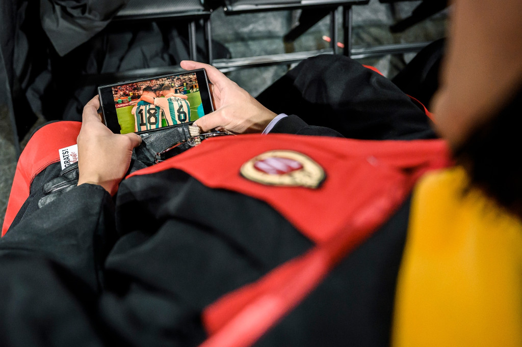 Several graduates watched the World Cup Final on their phones during commencement. Argentina defeated France.