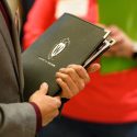 A student. talks with a recruiter during the annual Spring Career and Internship Fair held at the Kohl Center on Feb. 5, 2019. 