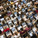 Students follow along with the lecture on their laptop computers in Chemistry 103 in Agricultural Hall.