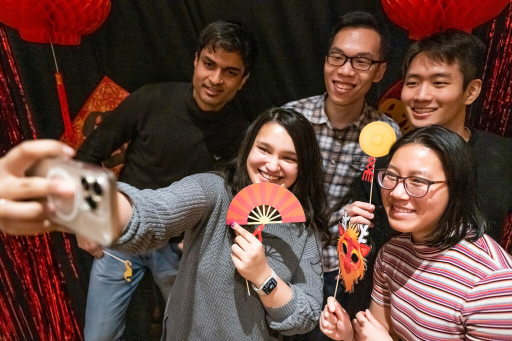 Pictured clockwise from upper left, Saswat Nayak, Jianping Li, Byung Uk Park, Lisa Je and Srija Chakraborty pose for a group photo during the CHASA celebration.