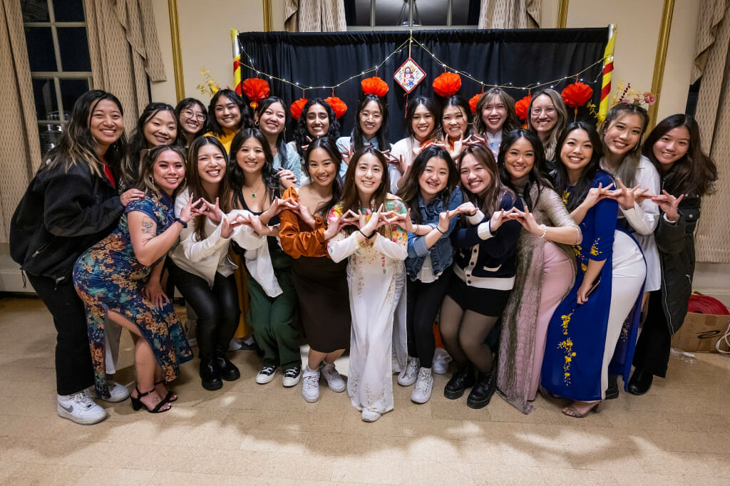 Students and guests pose for a large group photo in the Memorial Union’s Great Hall.