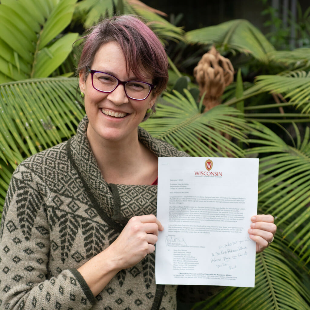 Katherine McCulloh holds the signed letter on UW–Madison letterhead announcing that she has been named the first to hold the newly created Rebecca Blank Professorship.