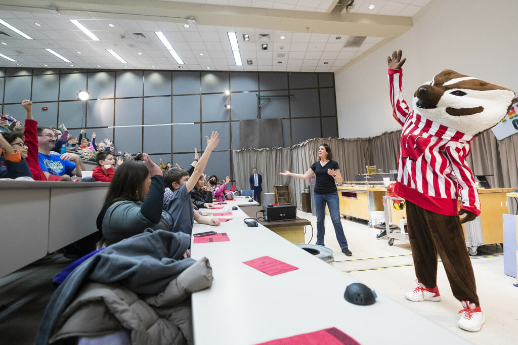 Bucky Badger hypes up the crowd during the 40th year of The Wonders of Physics in Chamberlin Hall.