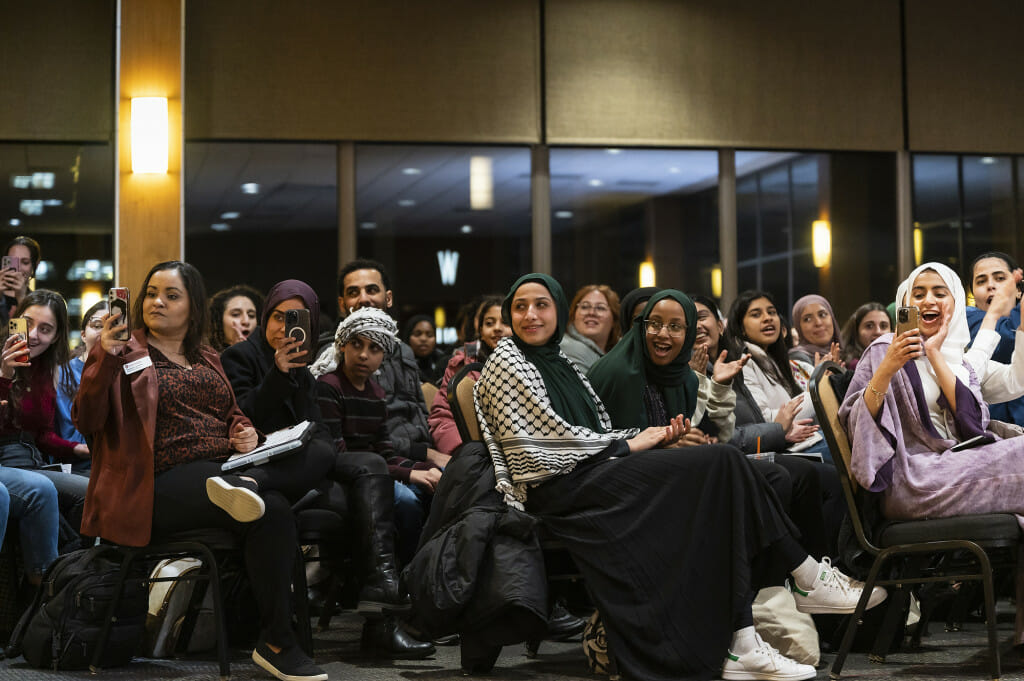 The crowd was wowed by the fashion show, which featured traditional clothing from many cultures.