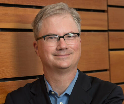 A headshot photo of Holden Thorp. Thorp has short blond hair and glasses. He is smiling and looking directly to the camera.