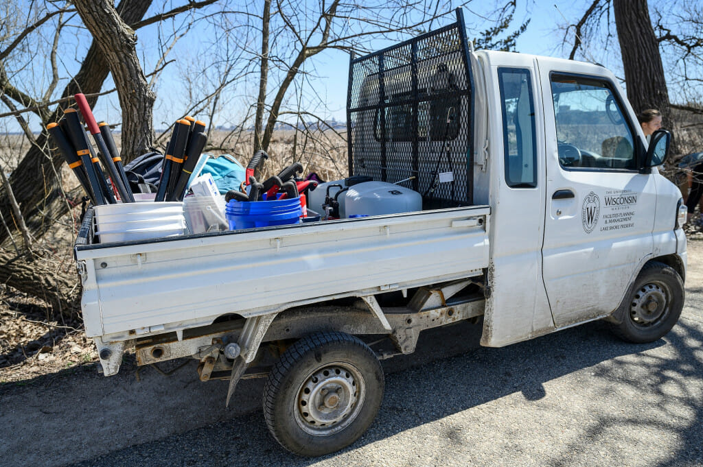 A vehicle carrying saws, loppers, and snacks for volunteers sits ready during Bucky’s Big Event.