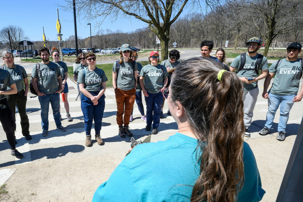 Bryn Scriver, volunteer and outreach coordinator at the Lakeshore Nature Preserve, orients volunteers during Bucky’s Big Event.