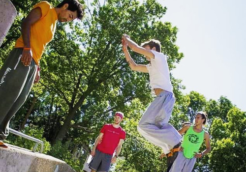 A man jumps in the air for a trick.