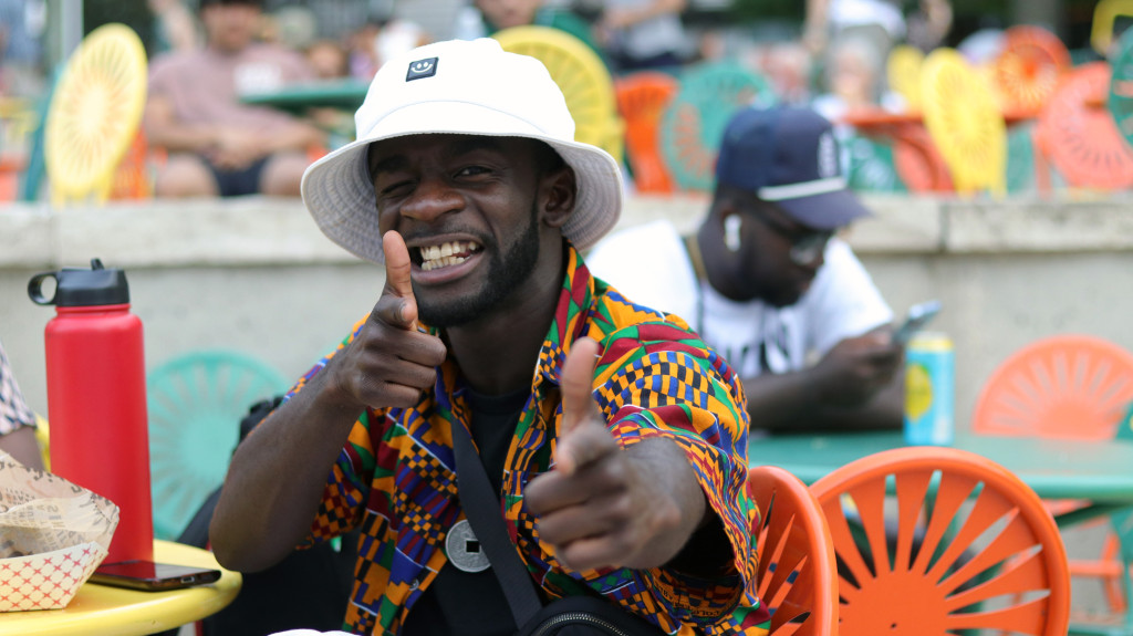 A man smiles at the camera