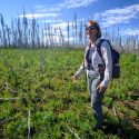 Monica Turner stands in the Berry Glad fire area