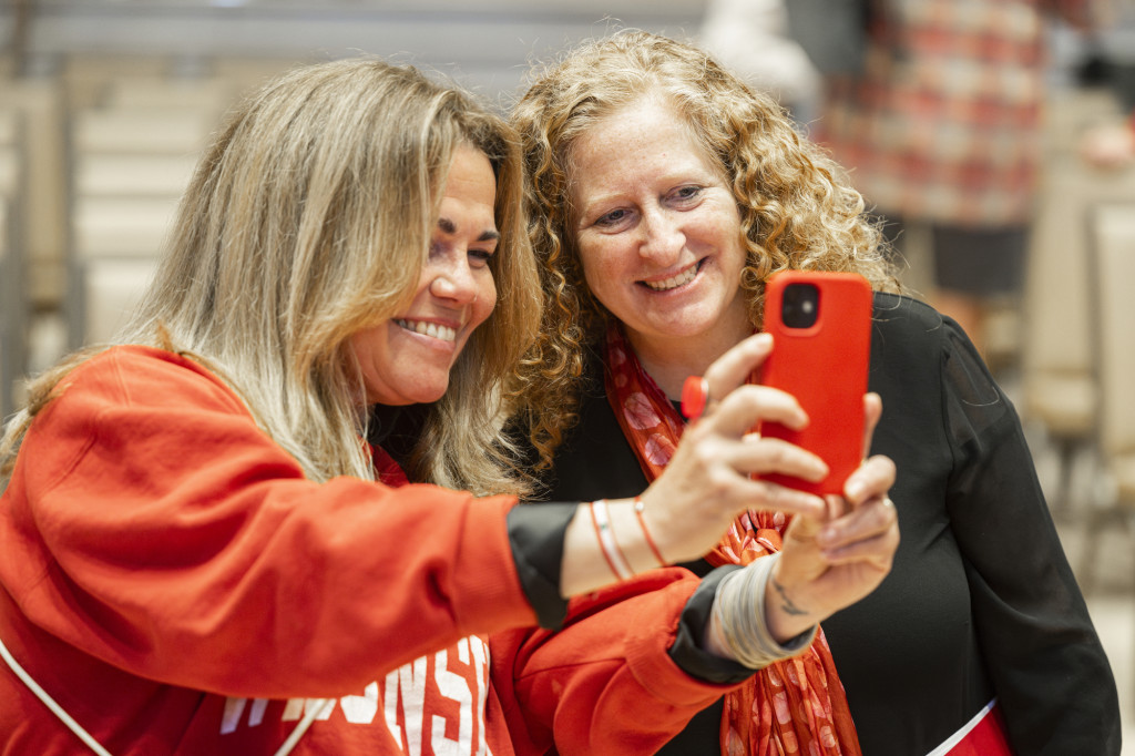 Two people pose for a selfie.