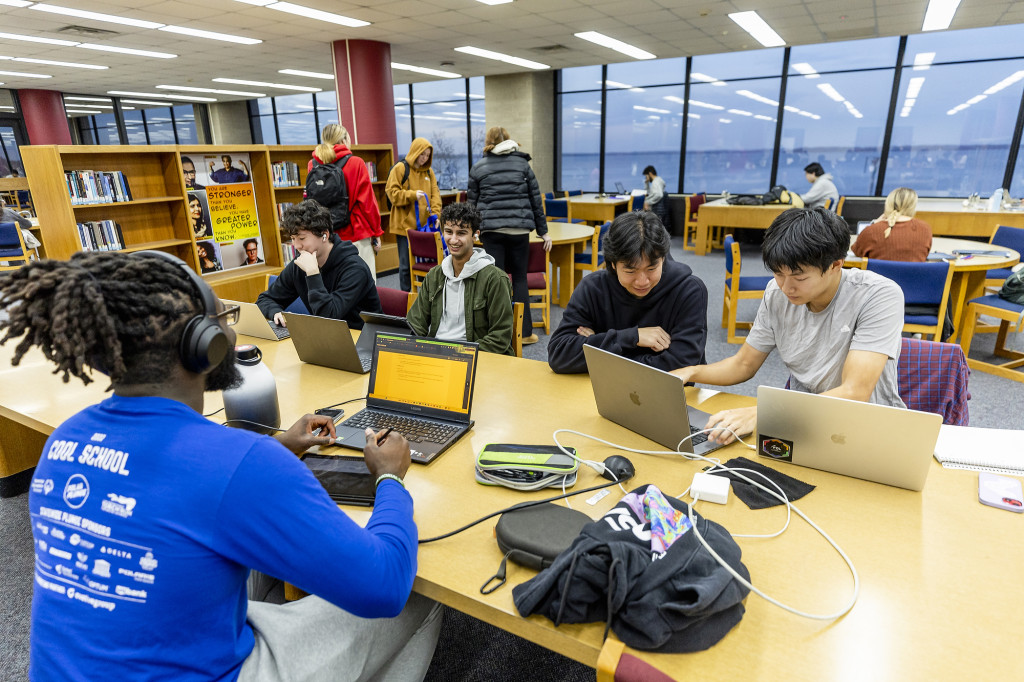 A group of students study together.