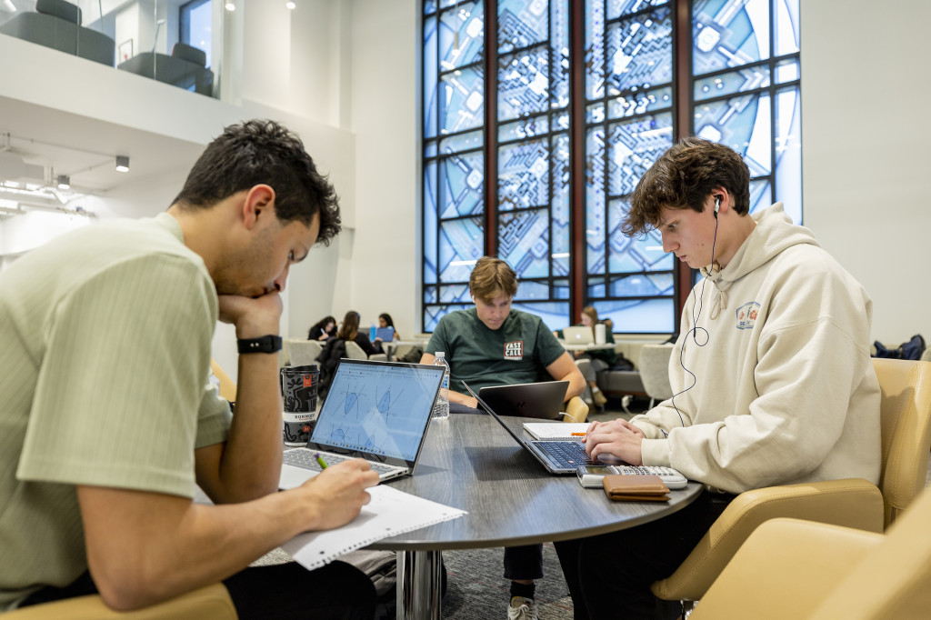 A group of students study together.