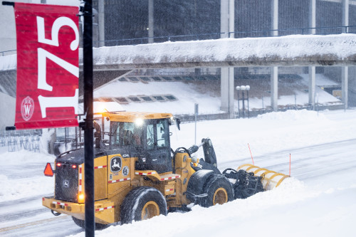 A plow clears snow.