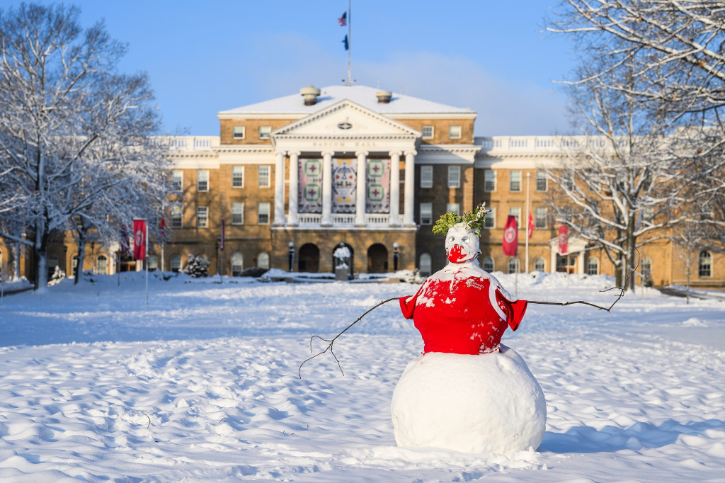 A snowman on Bascom Hill has a red shirt.